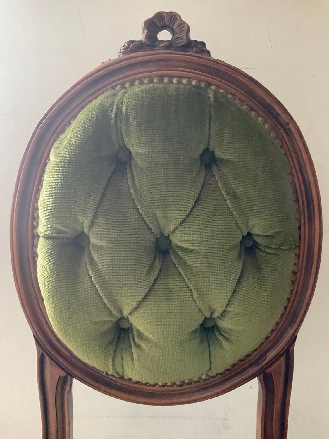 Antique wooden and velvet upholstered chair