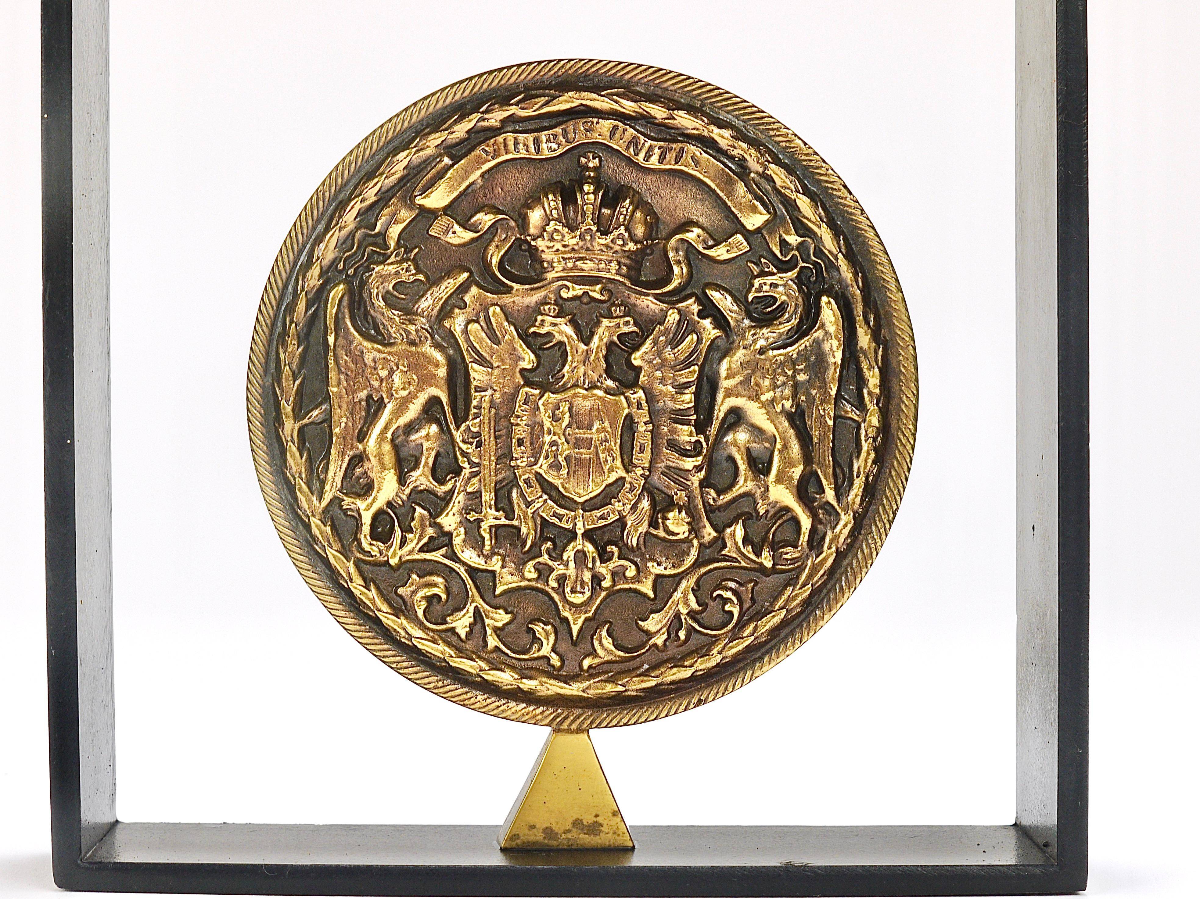 Iron and brass medal Carl Aubock bookends mid-century, Austria, 1970s