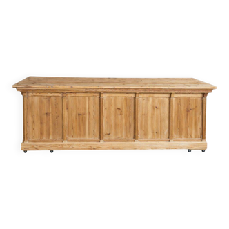 Large antique haberdashery counter in raw wood – 296 cm