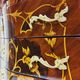 Marquetry chest of drawers with inlay in Louis XV style