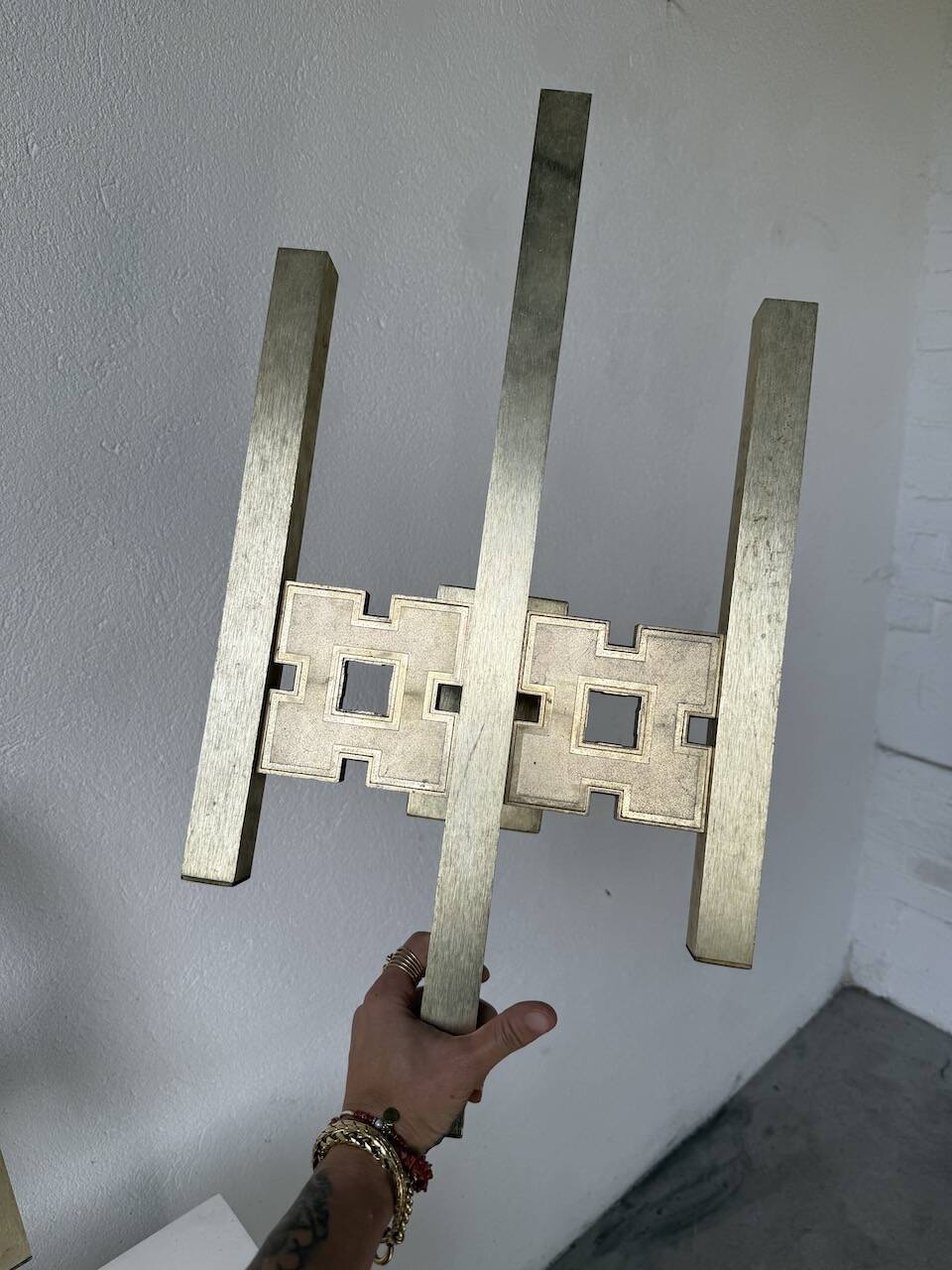 Pair of Regency brass wall lights in Italy