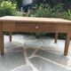 Table basse bois brut cirée