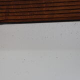 Beveled mirror grooved wood