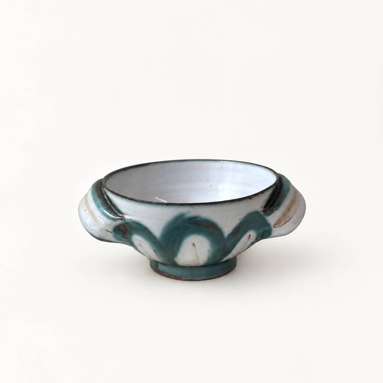 Ceramic bowl by R. Picault with wave decoration from the 1960s.