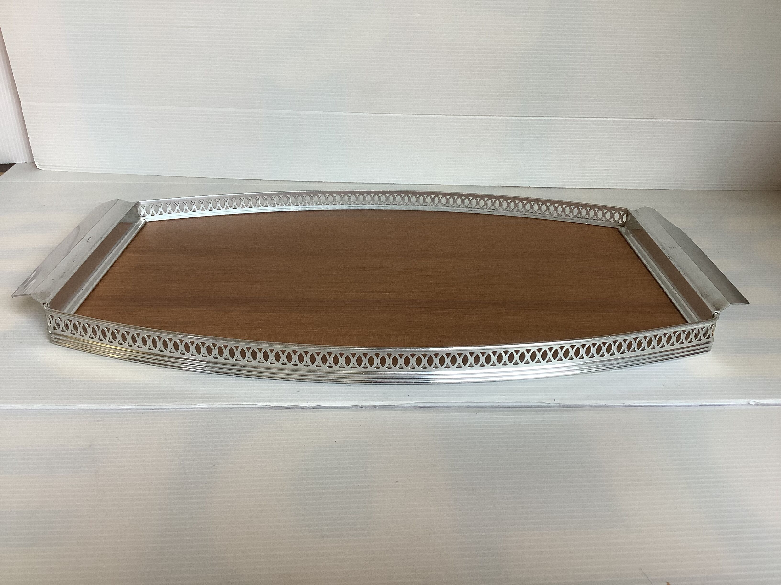 Openwork metal formica tray