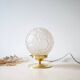 Art Deco table lamp with daisies