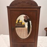 Wall cabinet with oval wall and drawer