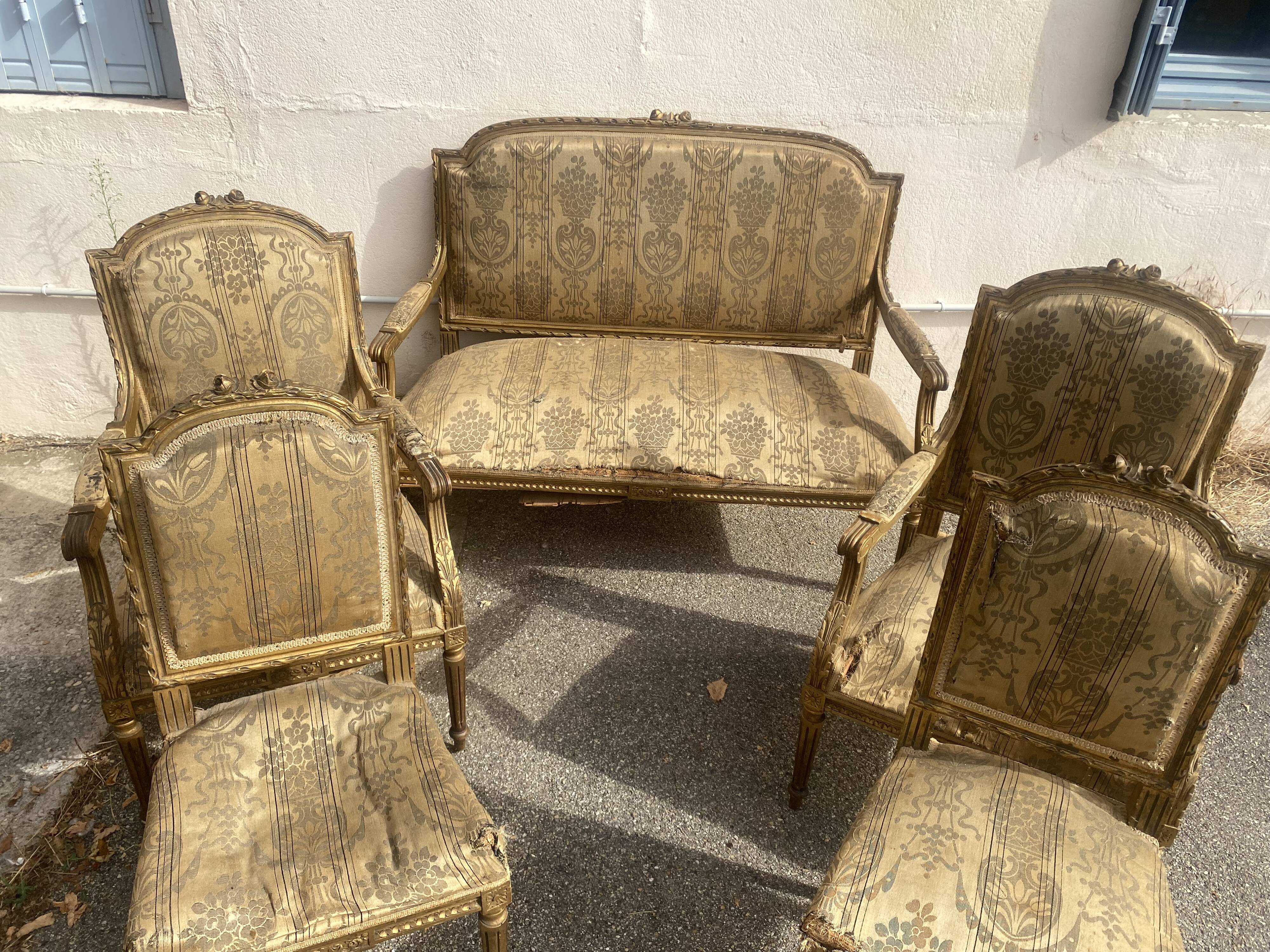 Louis XVI style living room in gilded wood. Napoleon III period