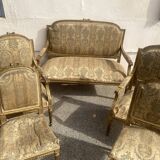Louis XVI style living room in gilded wood. Napoleon III period