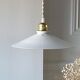 Suspension in opaline