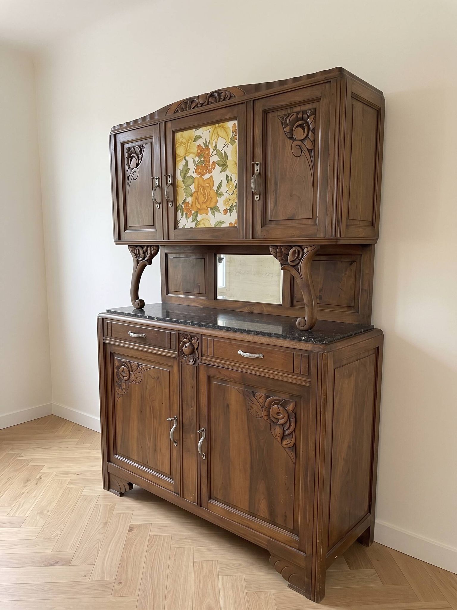 Antique Art Nouveau display cabinet in carved wood with marble top.