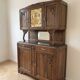 Antique Art Nouveau display cabinet in carved wood with marble top.