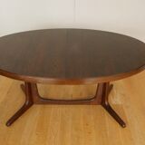 Extendable oval elm table with Baumann extensions