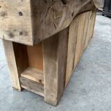 Early 20th century workbench transformed into a TV cabinet