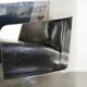Industrial Aviator design armchair in cowhide finished with aluminium