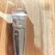 Antique sugar tongs in silvered metal