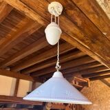 Sliding suspension chandelier with counterweight and smooth openwork plate