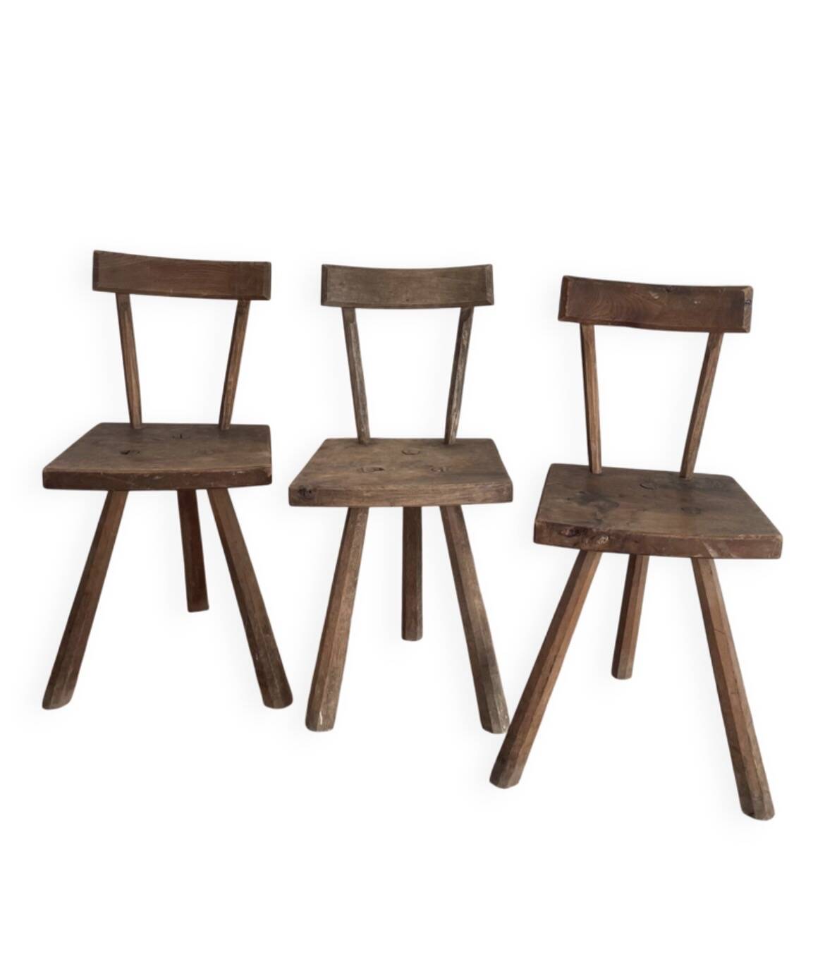 Set of three wooden tripod chairs in oak, raw art.