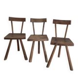Set of three wooden tripod chairs in oak, raw art.