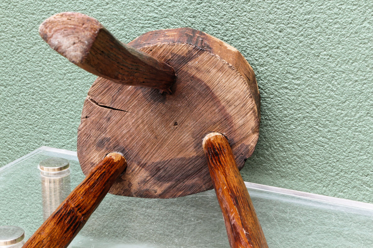 Pair of brutalist stools, tripods