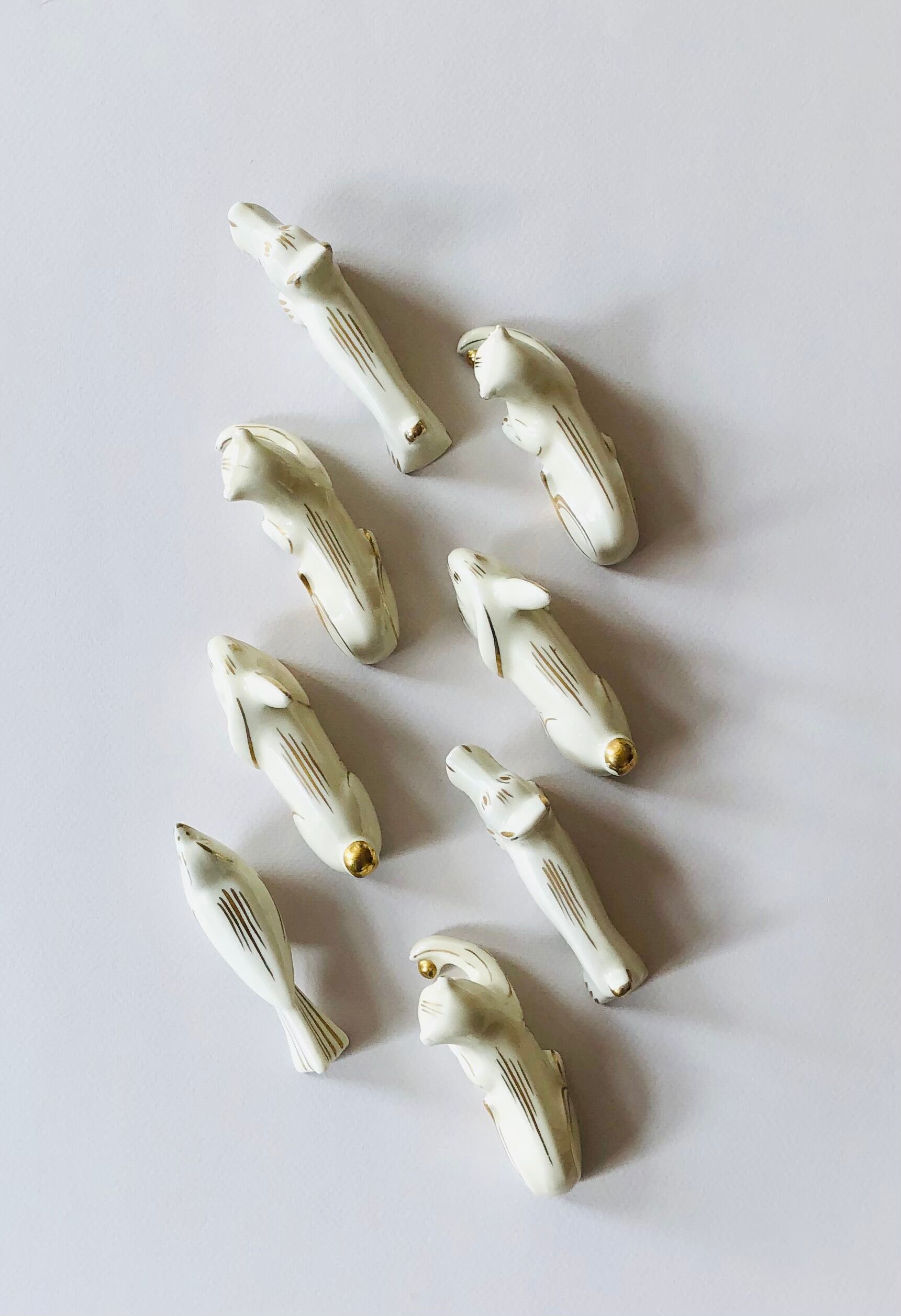 Set of 8 art deco ceramic animal knife holders
