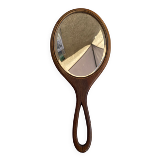 Hand-facing wooden mirror