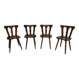 4 wooden chairs with brutalist design
