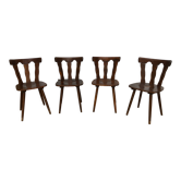 4 chaises en bois au design brutaliste