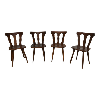 4 wooden chairs with brutalist design