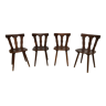 4 chaises en bois au design brutaliste