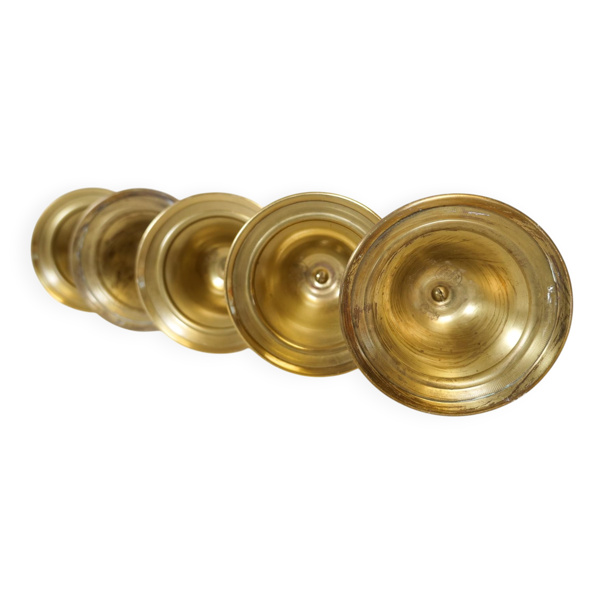 Mid-century set of 5 brass candlesticks by Lars Holmström, Arvika, Sweden.