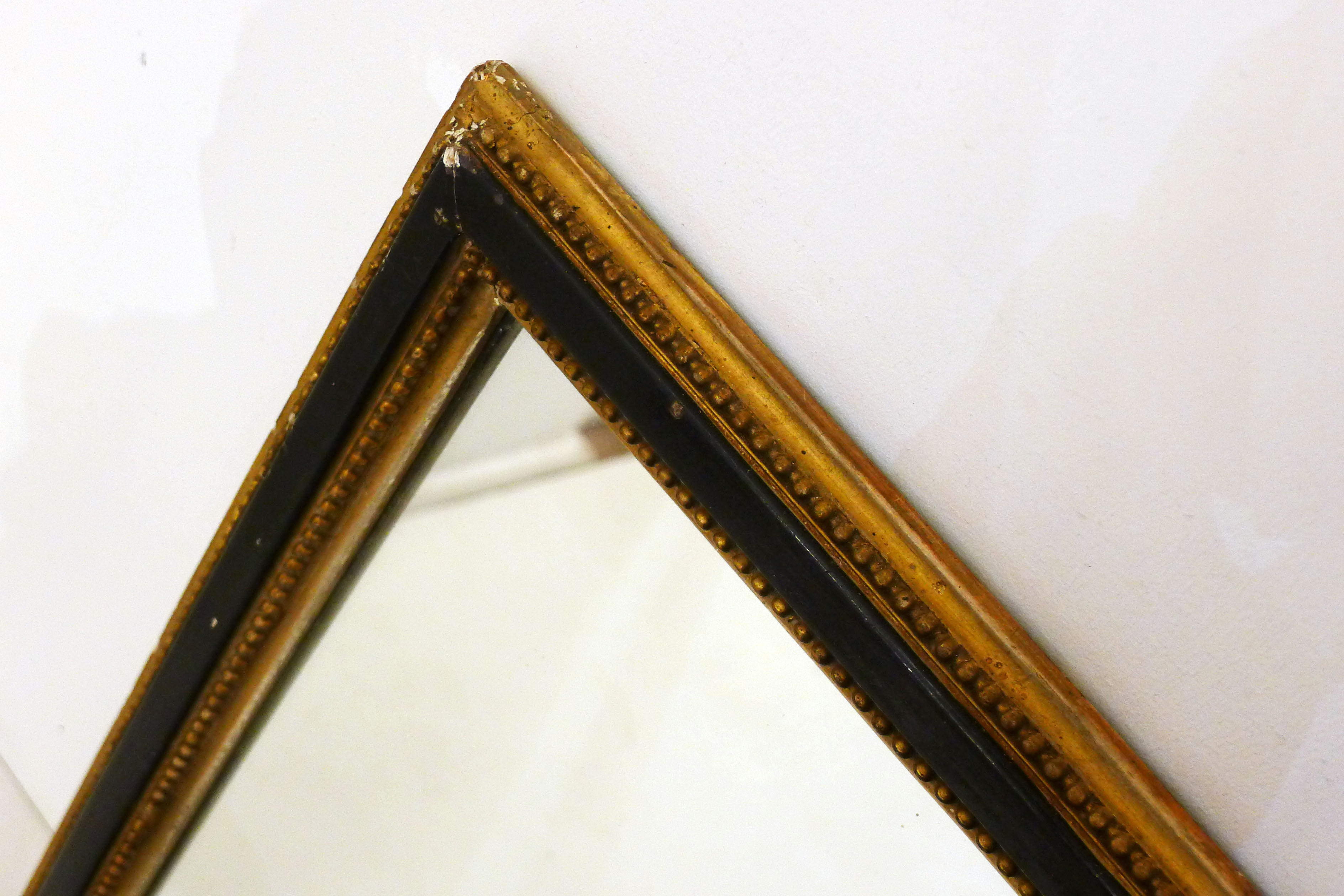 Miroir noir et frises de perles dorées - 42x42cm
