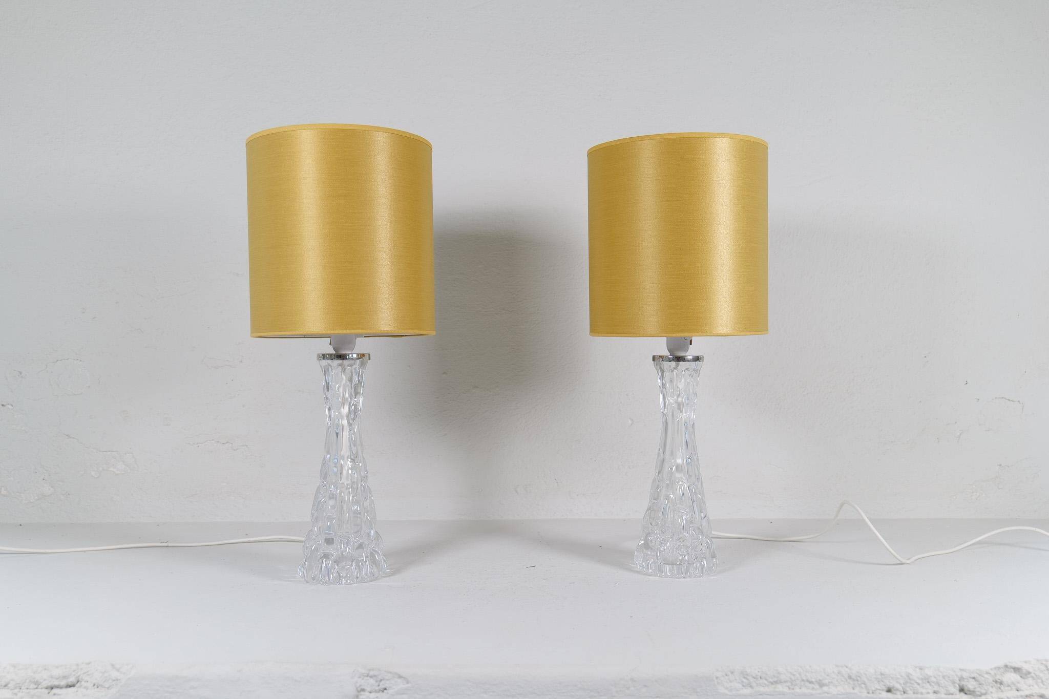 Mid-century modern crystal table lamps by Orrefors, designed by Carl Fagerlund, Sweden, 1970s.