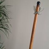 Coat rack on wood and black stand