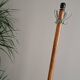 Coat rack on wood and black stand
