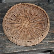 Vintage brown wicker round basket from the 1940s, woven flat, diameter 37 cm.