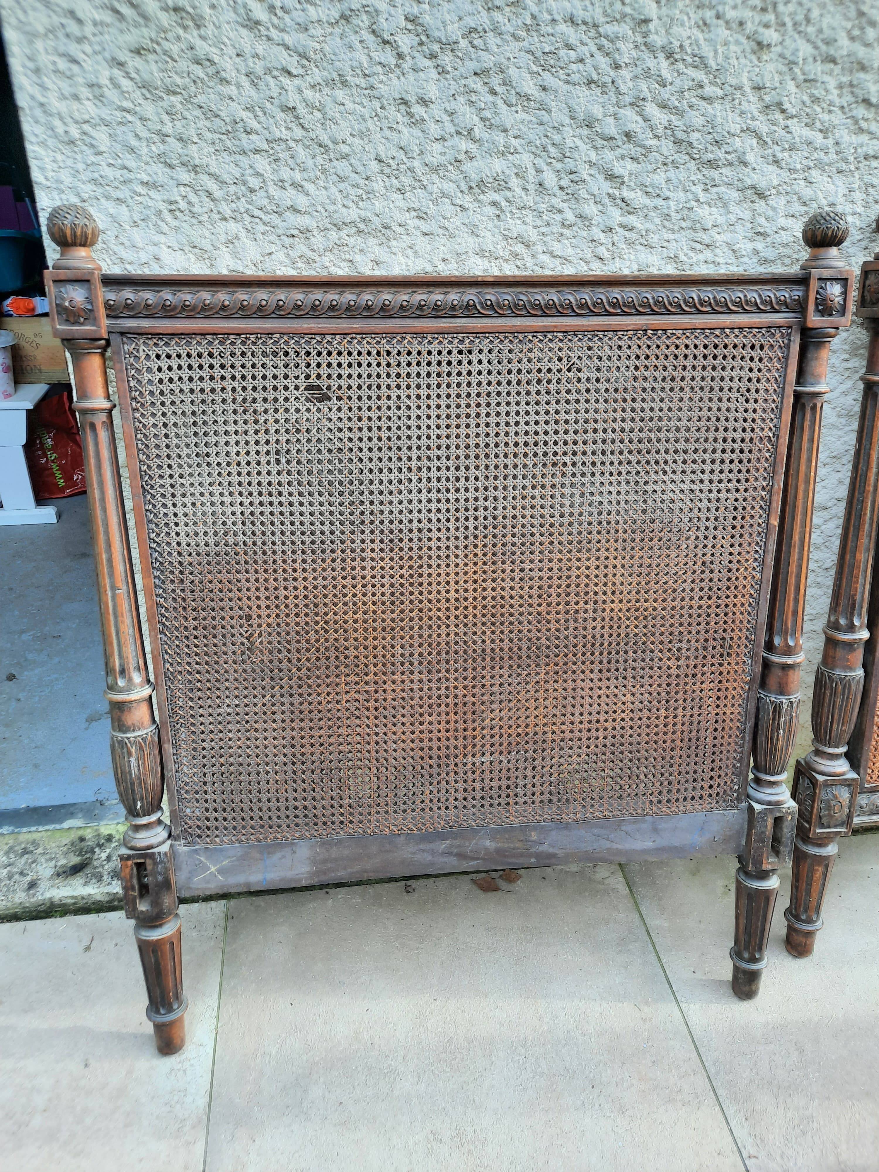 Hand-carved Louis XVI style headboards with chic vintage caning (1800s)