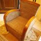 Pair of Club armchairs in ocean liner style, woven rattan and solid wood.