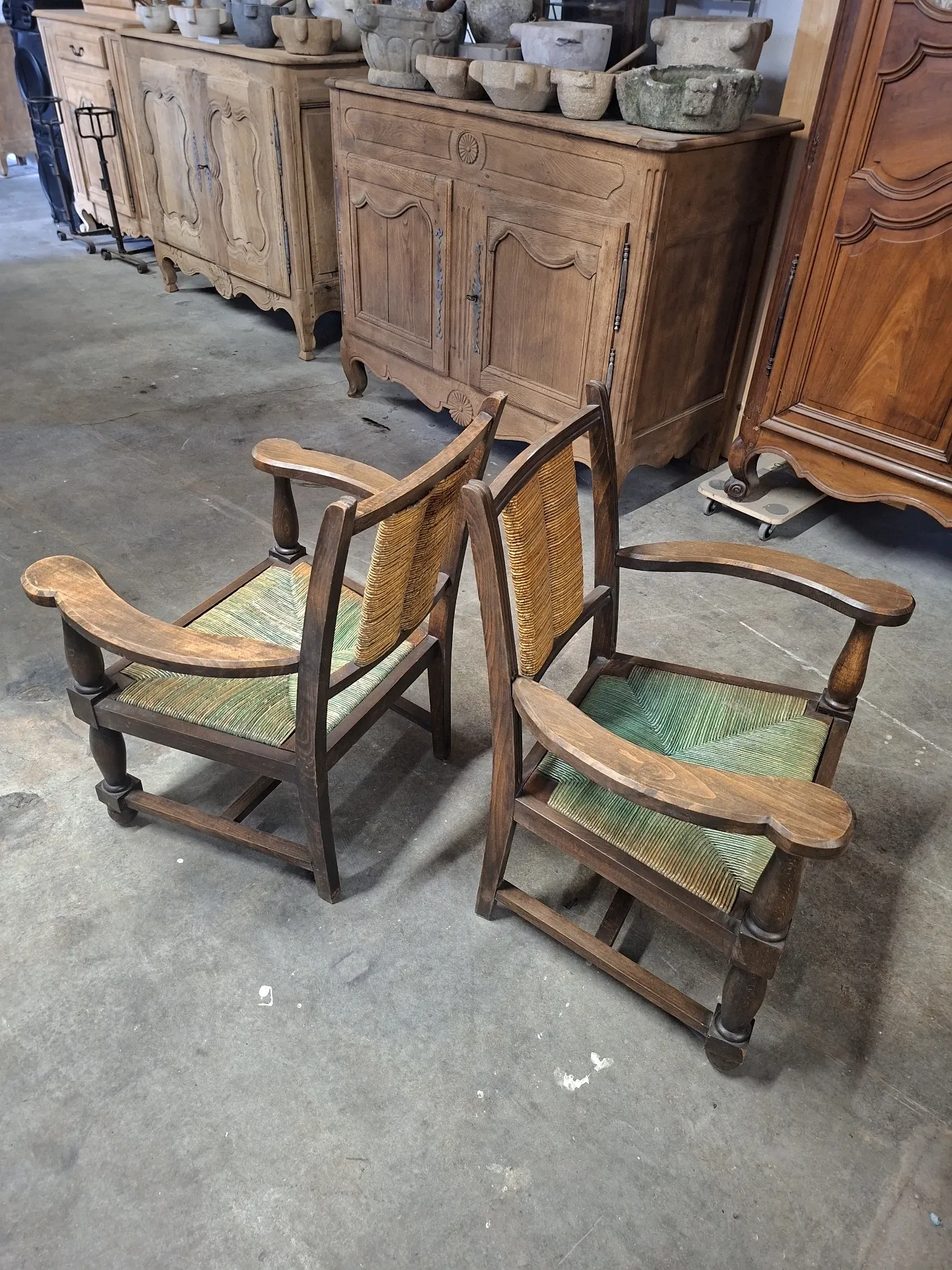 Brutalist pair of rustic turned wooden armchairs from the 1950s.
