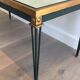 Table basse en acier patiné et doré dans le goût de Jacques Quinet