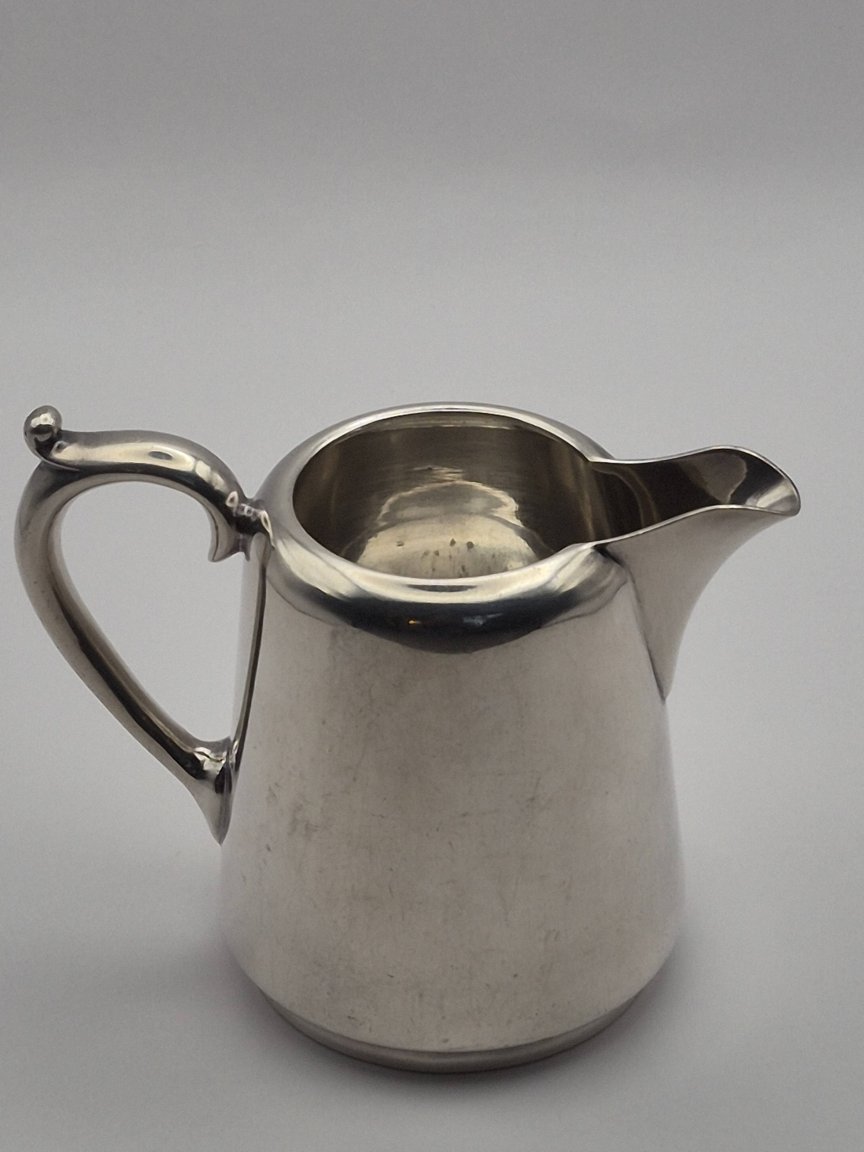 Superb vintage cream jug from the prestigious silversmithing house.