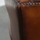 Fauteuil à oreilles en cuir de mouton