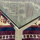 Chrome coffee table with a glass top from the 1980s.