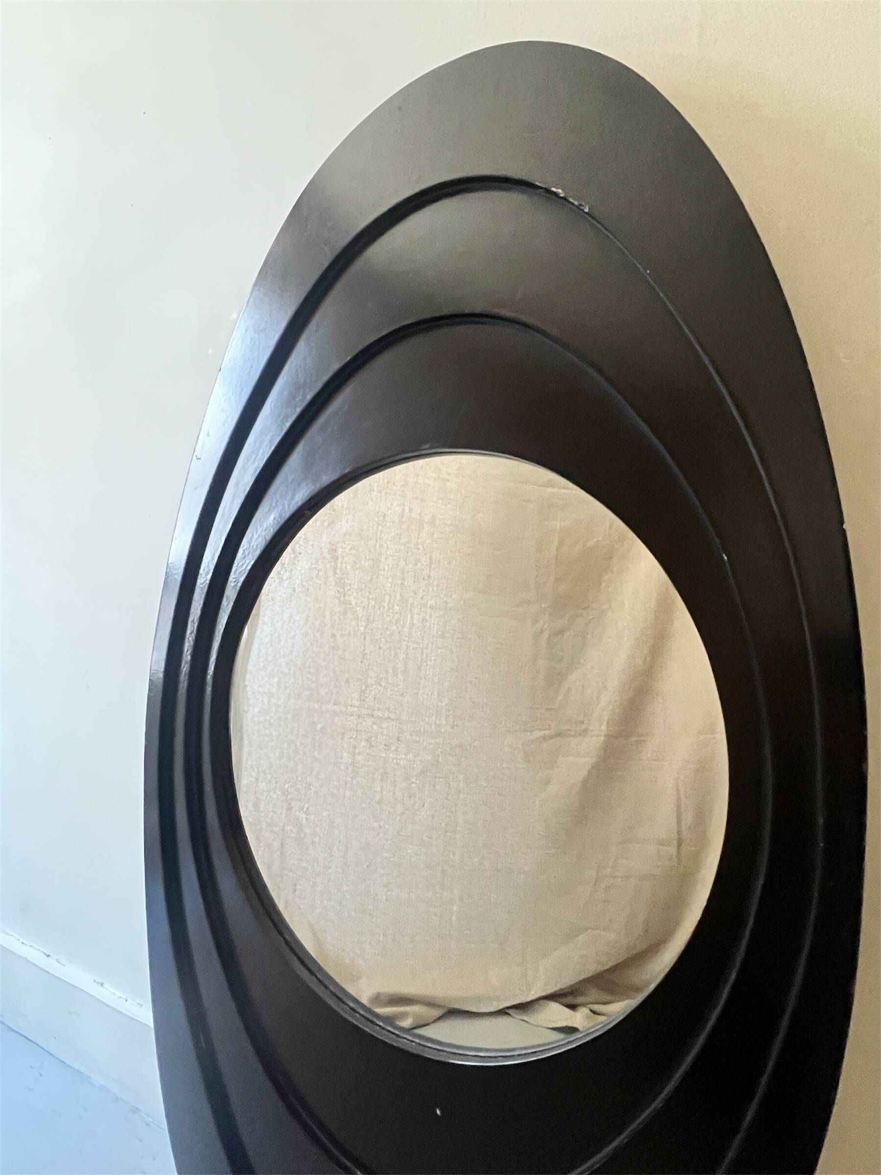 Large oval Italian mirror, modernist, space age design from the 1970s.