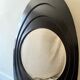 Large oval Italian mirror, modernist, space age design from the 1970s.