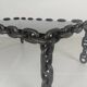 Vintage brutalist black iron chain link coffee table with original smoked glass, 70s