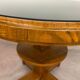 Art Deco game table with a black glass top.