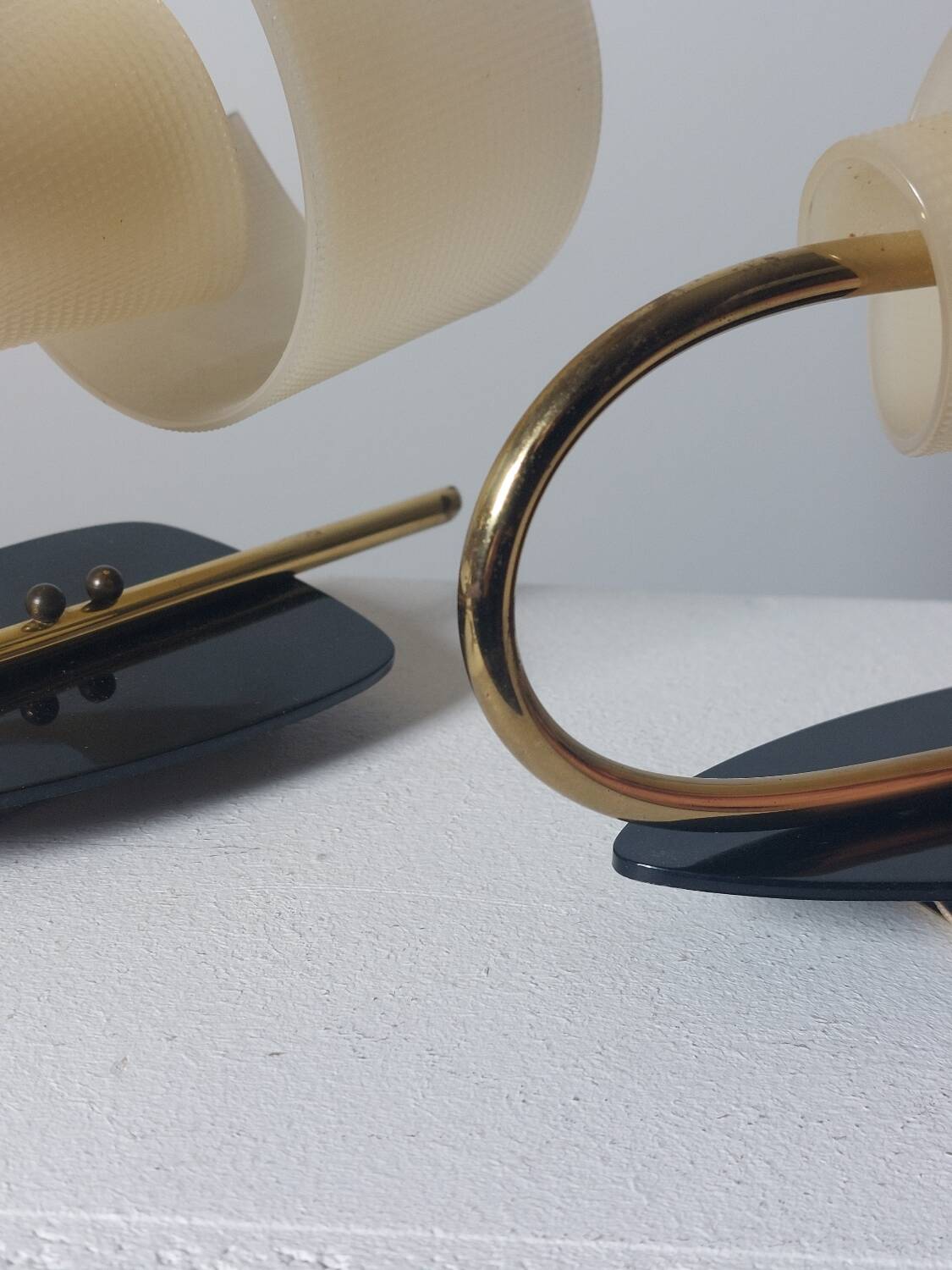 Pair of vintage wall lamps from the 1950s in brass.