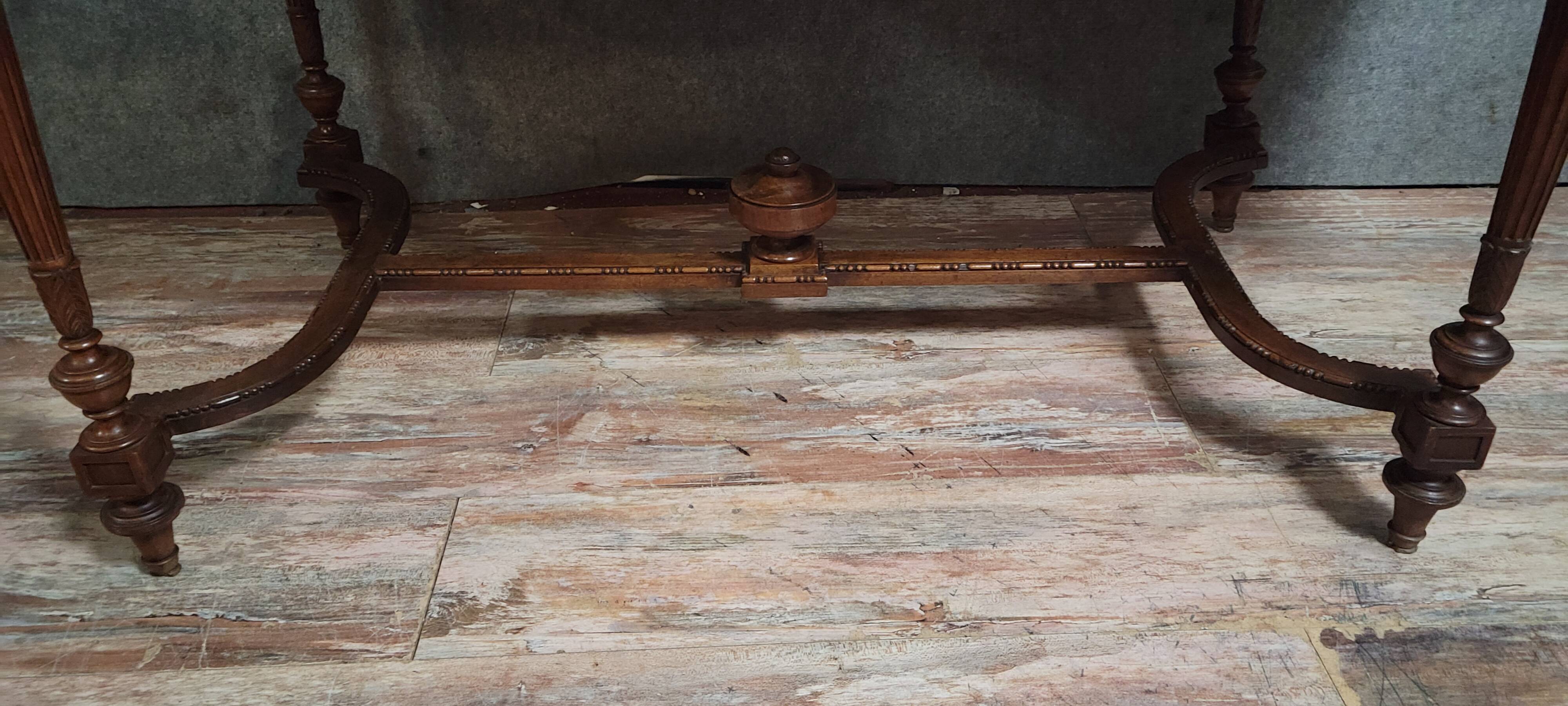 Louis XVI style desk with a curved top, in mahogany.