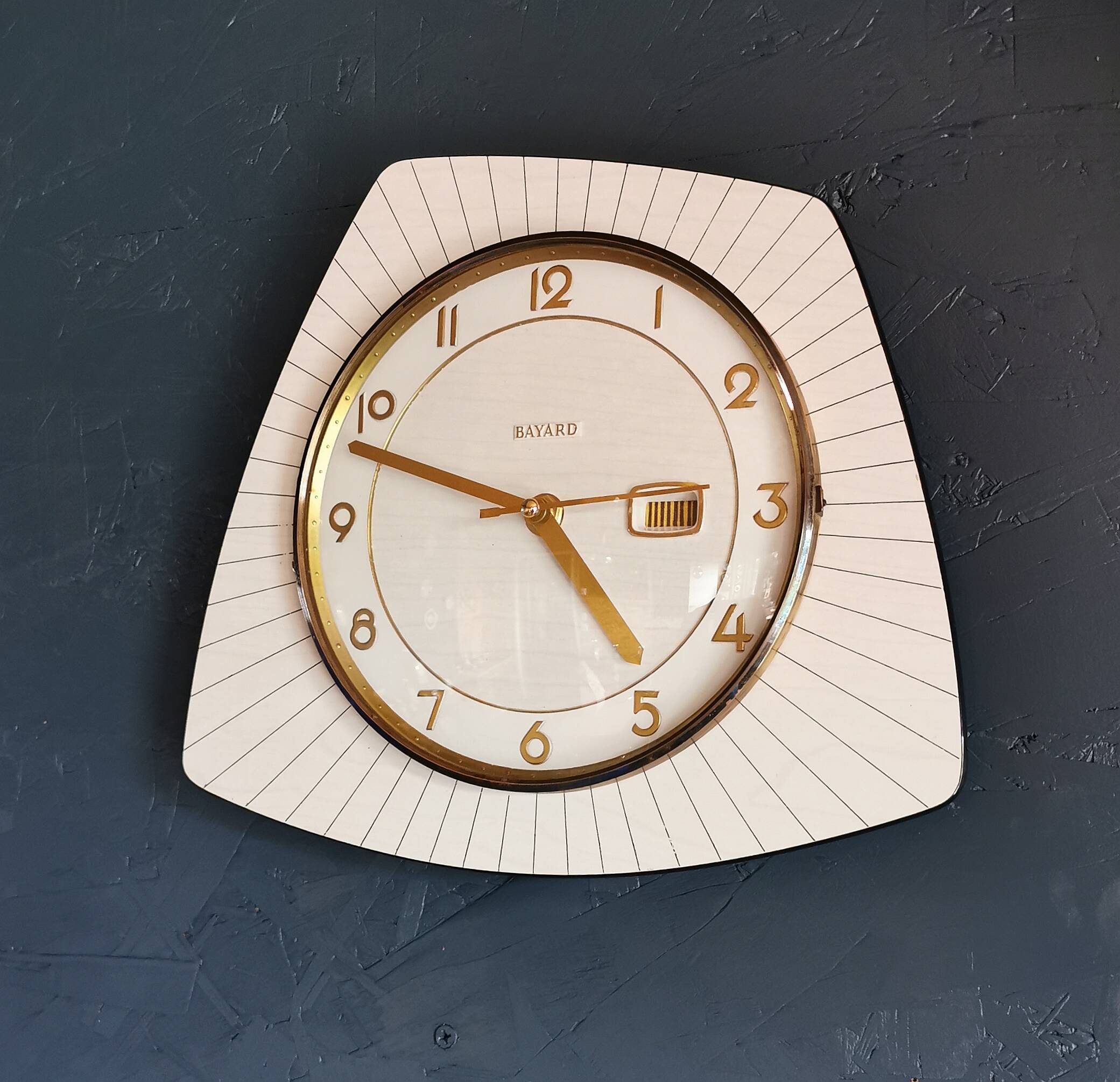 Vintage formica clock silent asymmetrical wall pendulum "Bayard wood lines"
